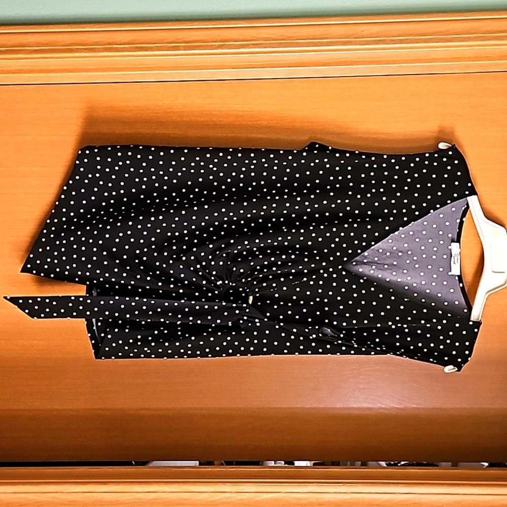 Black with white polka dots sleeveless blouse